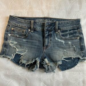 AE shortie lightly distressed jean shorts